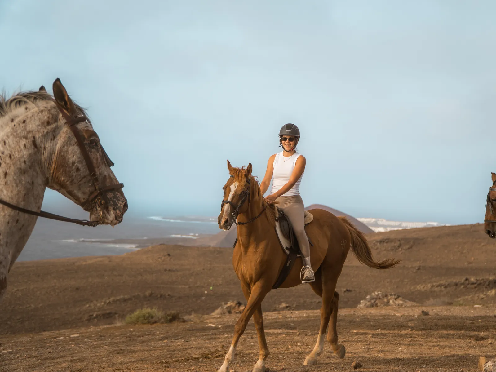A guide riding alongside on the inland trail